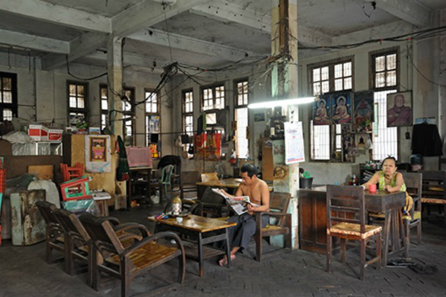 Ye Min Than and Daw Thein Nwet reside in repurposed  office space on Pansodan Street. PHOTO/TIMWEBSTER
