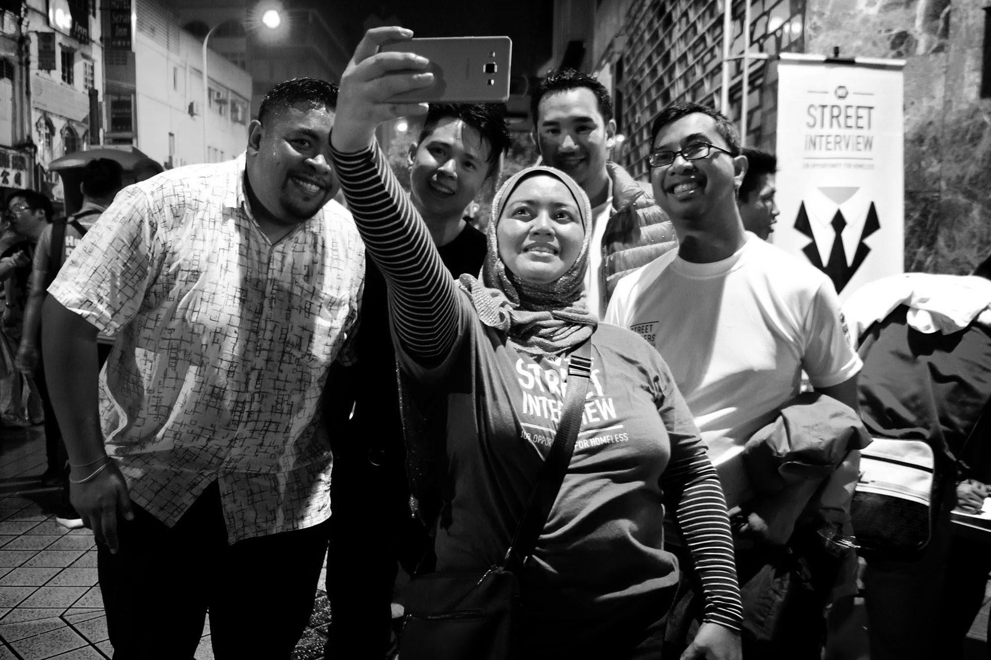 A selfie of changemakers (Dr S. Madhu Sudhan, Low Liew and Syed Azmi) Camera held by Hayati Ismail (Photo by Kamal Sellehuddin/Coconuts KL)