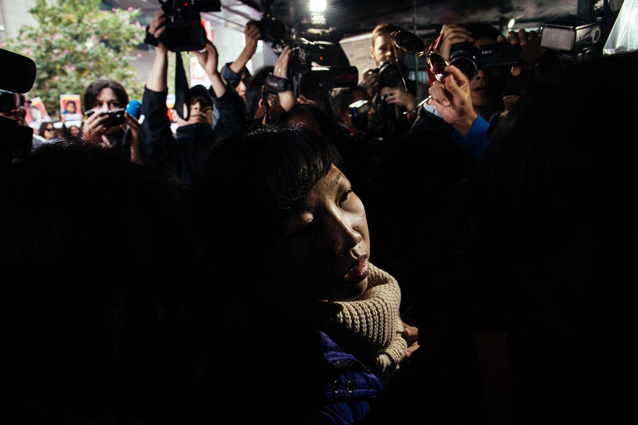 Erwiana Sulistyaningsih arrives at Wan Chai District Court in December 2014 for the trial of her former employer Law Wan-tung. The shocking abuse Erwiana suffered made news internationally. 
