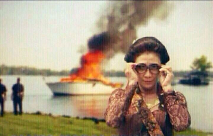 A popular meme of Maritime Resources and Fisheries Minister Susi Pudjiastuti depicting her walking away from a foreign boat that was blown up after being caught illegally fishing in Indonesia.