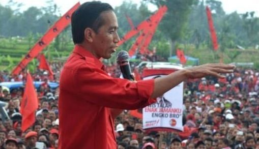 President Joko Widodo, a PDI-P cadre, on stage addressing his party’s supporters. Photo: AFP