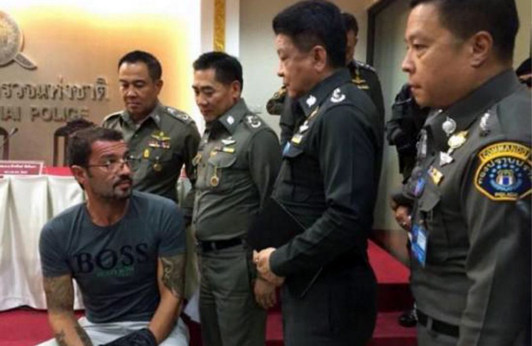 A photo of Justo, taken shortly after he was placed under arrest by Thai authorities in 2015