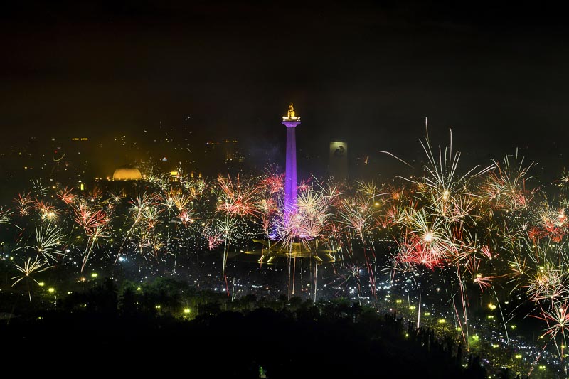 Fireworks around Jakarta’s National Monument (Monas)