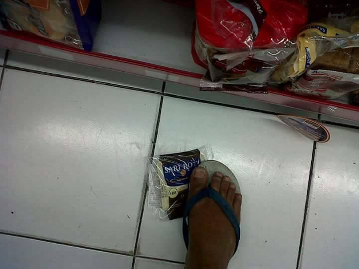 Sari Roti product being stepped on as part of the call for boycott of the bread company by some Muslims in Indonesia in December 2016. Photo: Facebook / KataKita