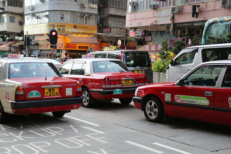 Taxis on a busy street in Hong Kong in 2015.