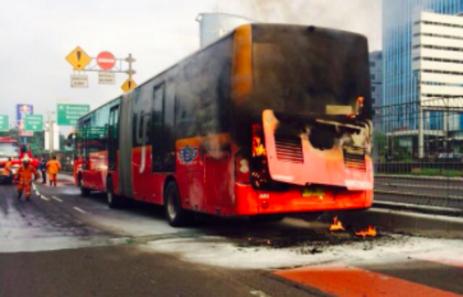 FILE PHOTO: A ZhongTong-made Transjakarta bus that caught on fire on Jalan Gatot Subroto, South Jakarta, in March 2015. The incident led to the Jakarta administration to ground and eventually decommission buses made by the Chinese auto manufacturers.