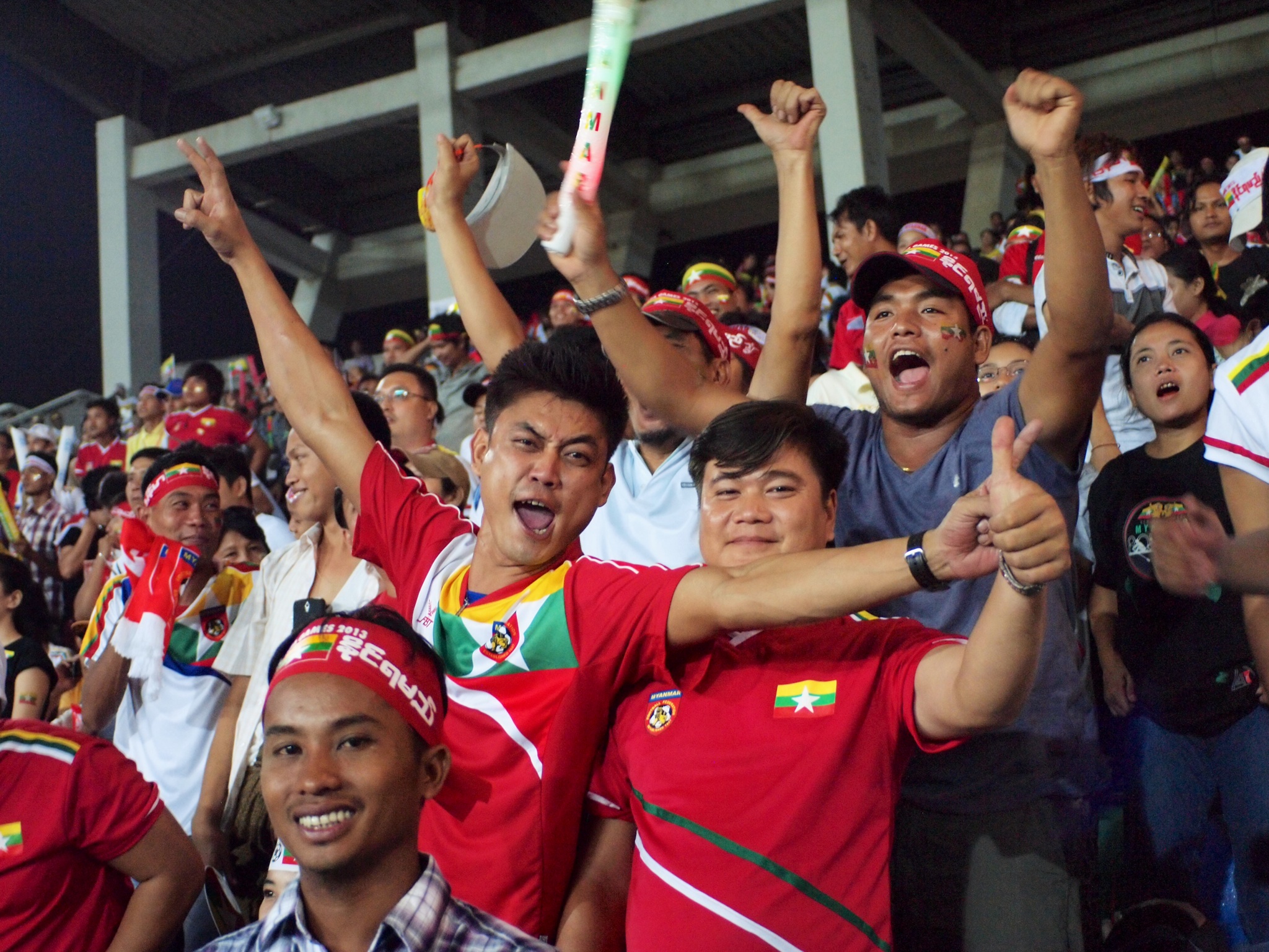 Myanmar football fans celebrate a goal. Photo: Flickr / HeyItsWilliam