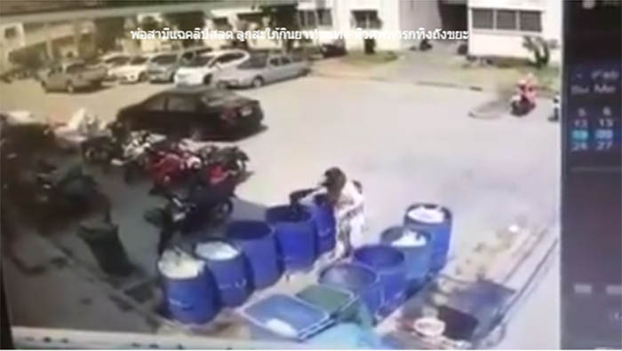 Screenshot from footage showing the girl dumping a bag in the trash that allegedly held the baby’s body. 