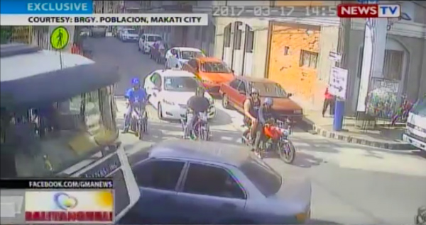 The traffic enforcer was given first aid by the baranggay rescue team. PHOTO: screen grab from YouTube