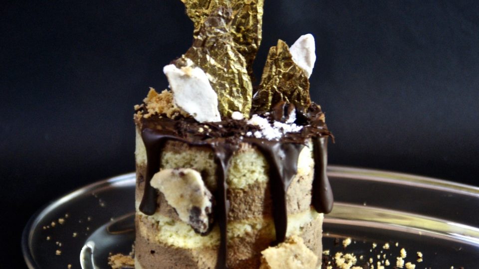 The Golden Coffee cake (pictured) is made of RTH Coffee, Coffee Mousse, Vanilla Almond Cookie,
Marble Cookie Shards, Meringue Shards, and Gold Plated Dark Chocolate. Photo: Facebook / Rangoon Tea House