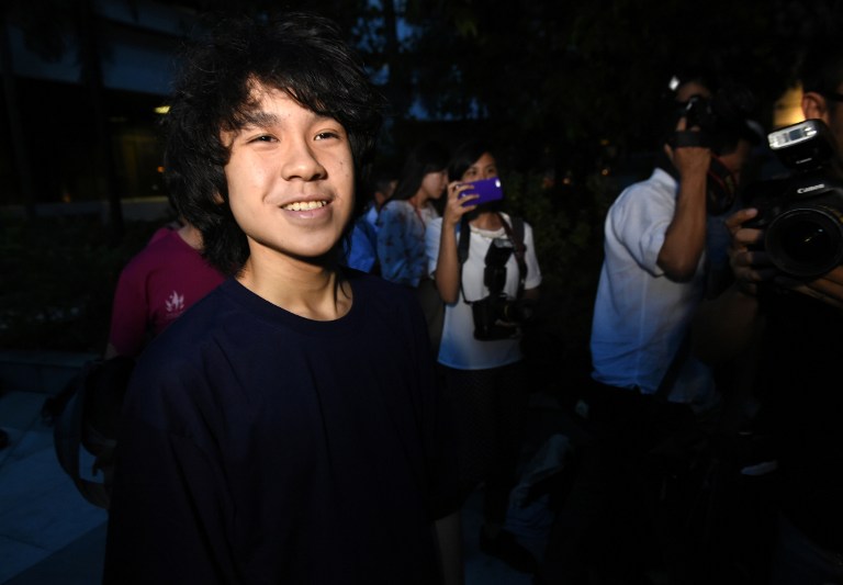 Amos Yee, 16, leaves the state court in Singapore on May 12, 2015.Photo: Roslan Rahman / AFP