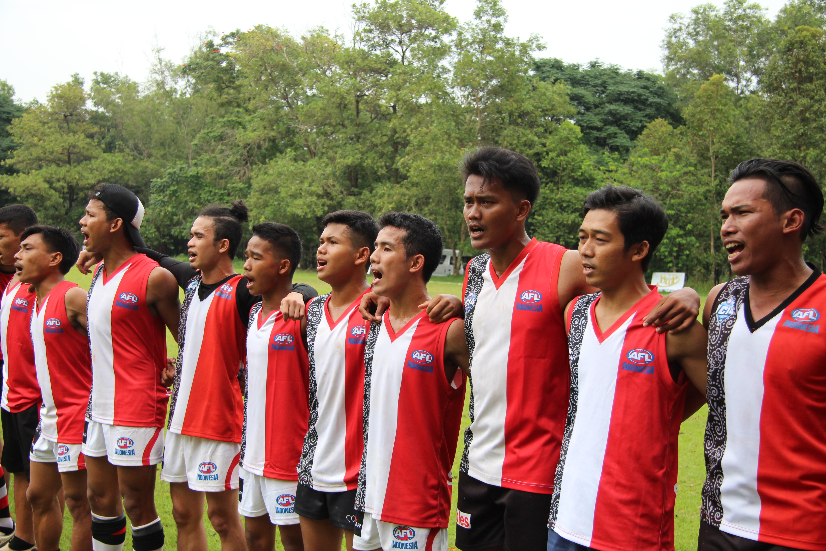 Indonesia Garudas players singing the National Anthem before their match with the Jakarta Bintangs on January 28, 2017. Photo: Luke Michael / Coconuts Media