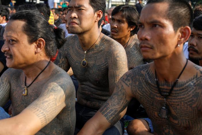 Devotees attend the religious tattoo festival at Wat Bang Phra, where they come to recharge the power of their sacred tattoos, in Nakhon Pathom province. Photos: Reuters