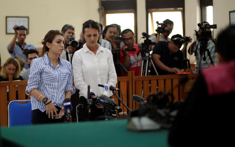Australian national Sara Connor stands beside her translator in a courtroom during sentencing for her role in the death of a police officer at the Denpasar District Court in Bali on March 13, 2017. Photo: Agung Parameswara/Reuters 