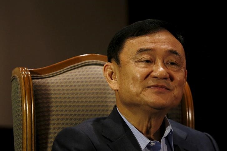 Former Thai Prime Minister Thaksin Shinawatra looks on as he speaks to Reuters during an interview in Singapore, February 23, 2016. Edgar Su/ Reuters