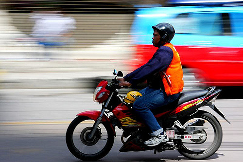 Photo of motorcycle taxi driver for illustration purposes only. Photo: Julhandiarso Handogo/Flickr