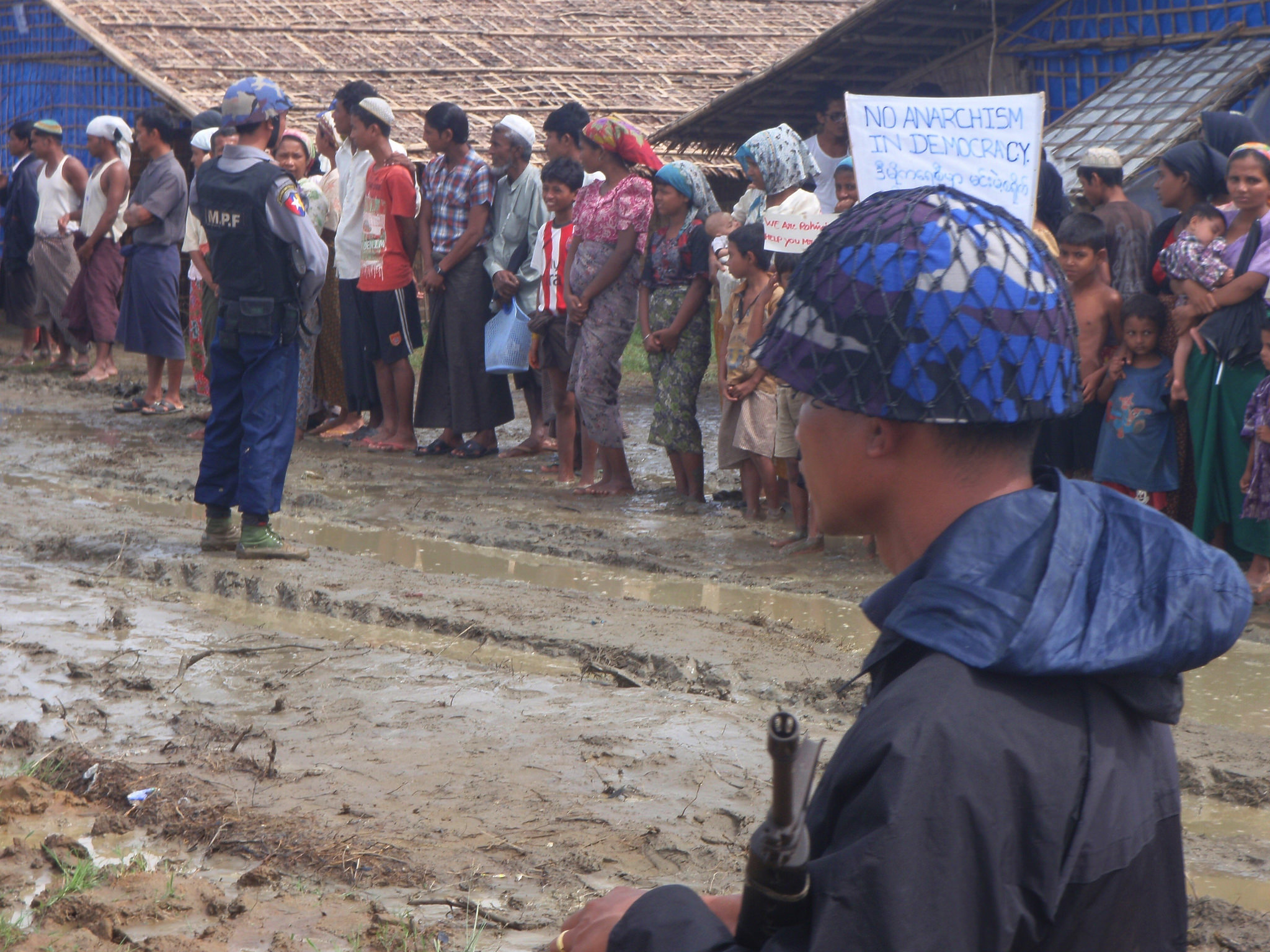 Myanmar police patrol an IDP camp in Rakhine State. Photo: Bernard Jaspers-Fajer EU/ECHO
