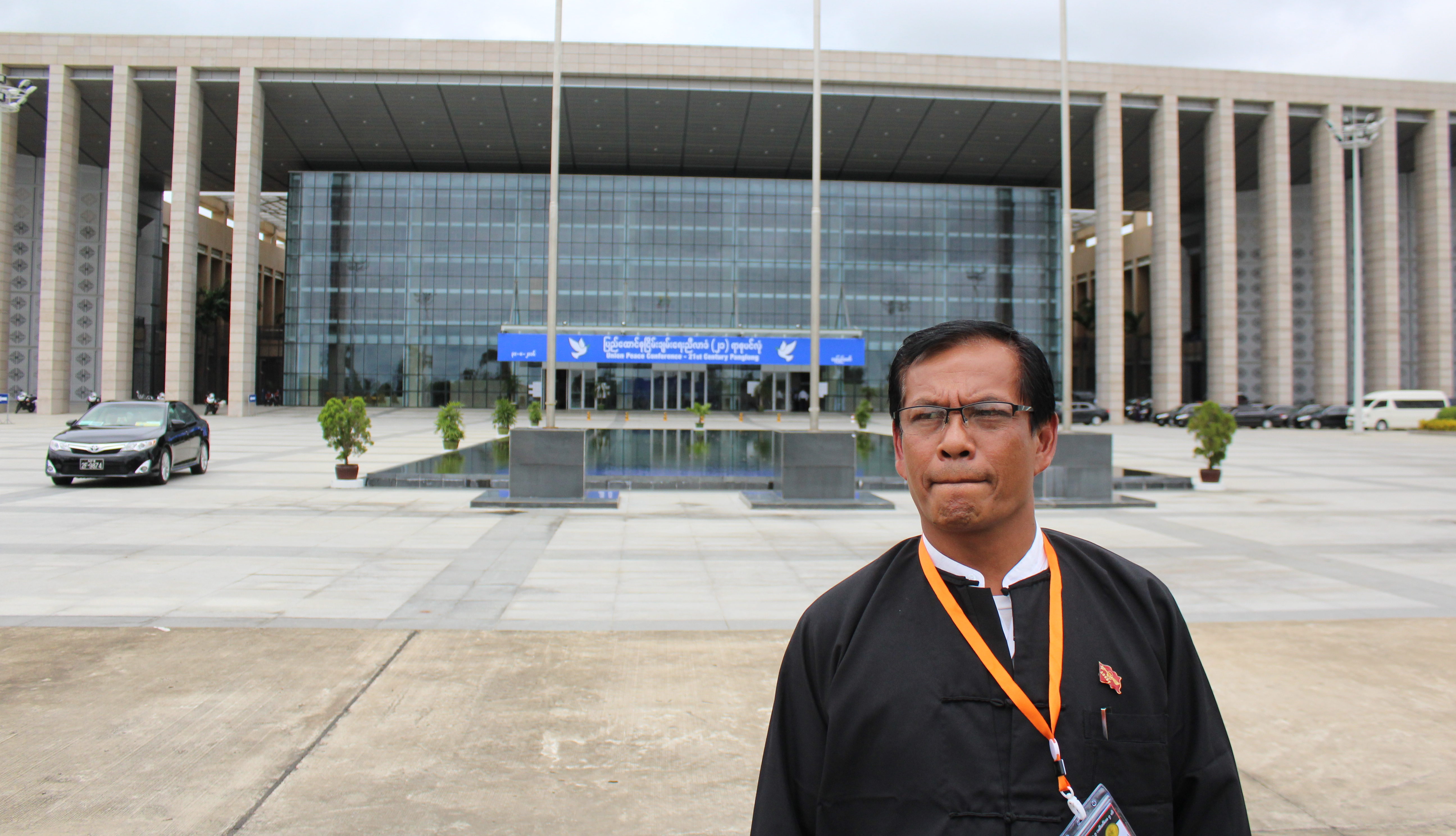 Ko Min Htay stands outside the Union Peace Conference in Nay Pyi Taw in September 2016. Photo: Jacob Goldberg