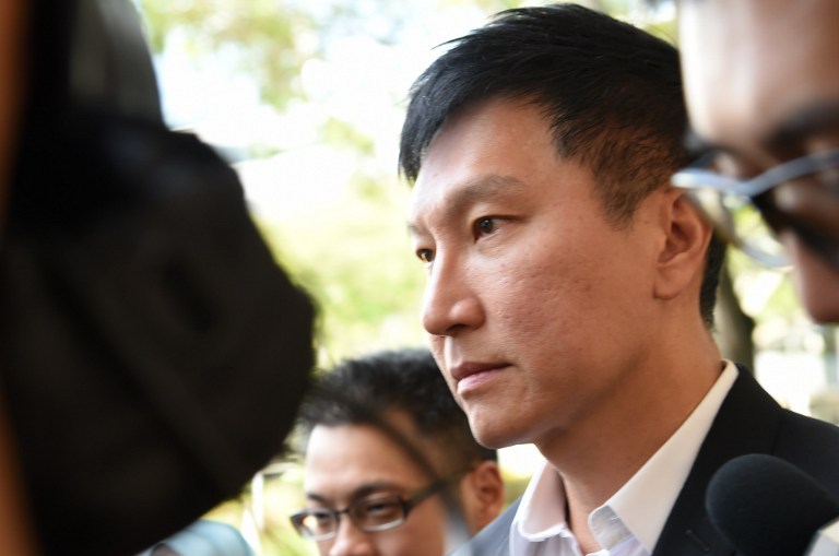 Kong Hee, the senior pastor of the City Harvest Church leaves the Supreme court in Singapore. Photo: Roslan Rahman / AFP