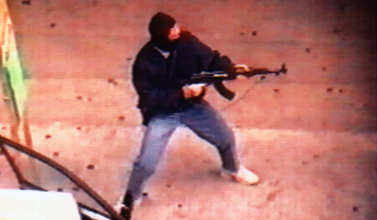An infamous photo of robber Yip Kai-foon holding an AK-47 assault rifle prior to his capture in May 1996. Photo: Supplied