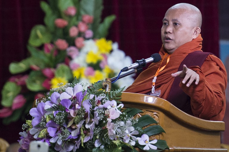 Myanmar hardline Buddist monk Wirathu speaks during a meeting following the decision of the State Sanhga Committee to abolish their group, in Yangon on May 27, 2017. 
/ AFP PHOTO / YE AUNG THU