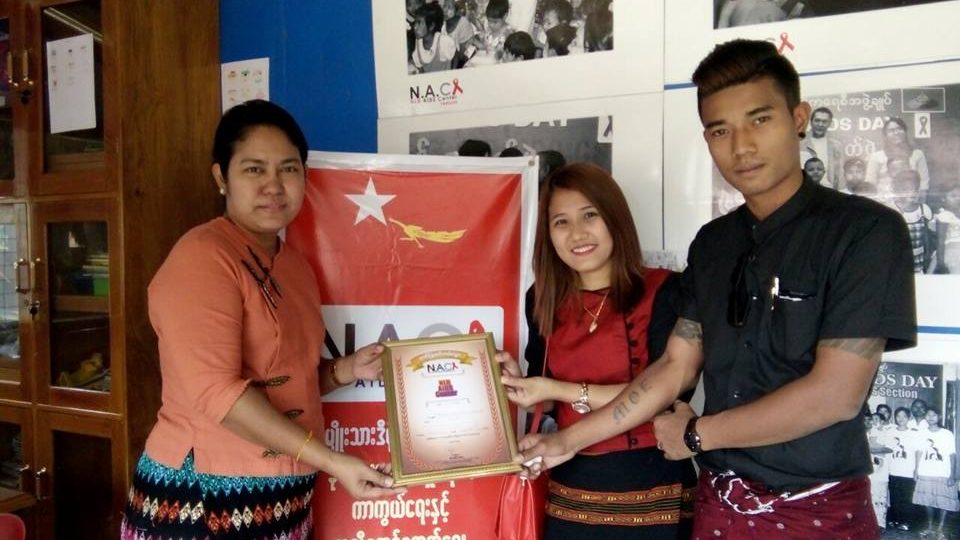 Phyu Phyu Thin (L) accepting a donation to the N.A.C., the NLD’S HIV/AIDS treatment center. Photo: Facebook / Phyu Phyu Thin
