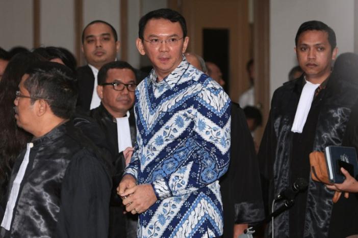 Jakarta Governor Basuki Tjahaja Purnama is seen inside a court during his trial for blasphemy in Jakarta, Indonesia May 9, 2017 in this photo taken by Antara Foto. Antara Foto/ Sigid Kurniawan/via REUTERS