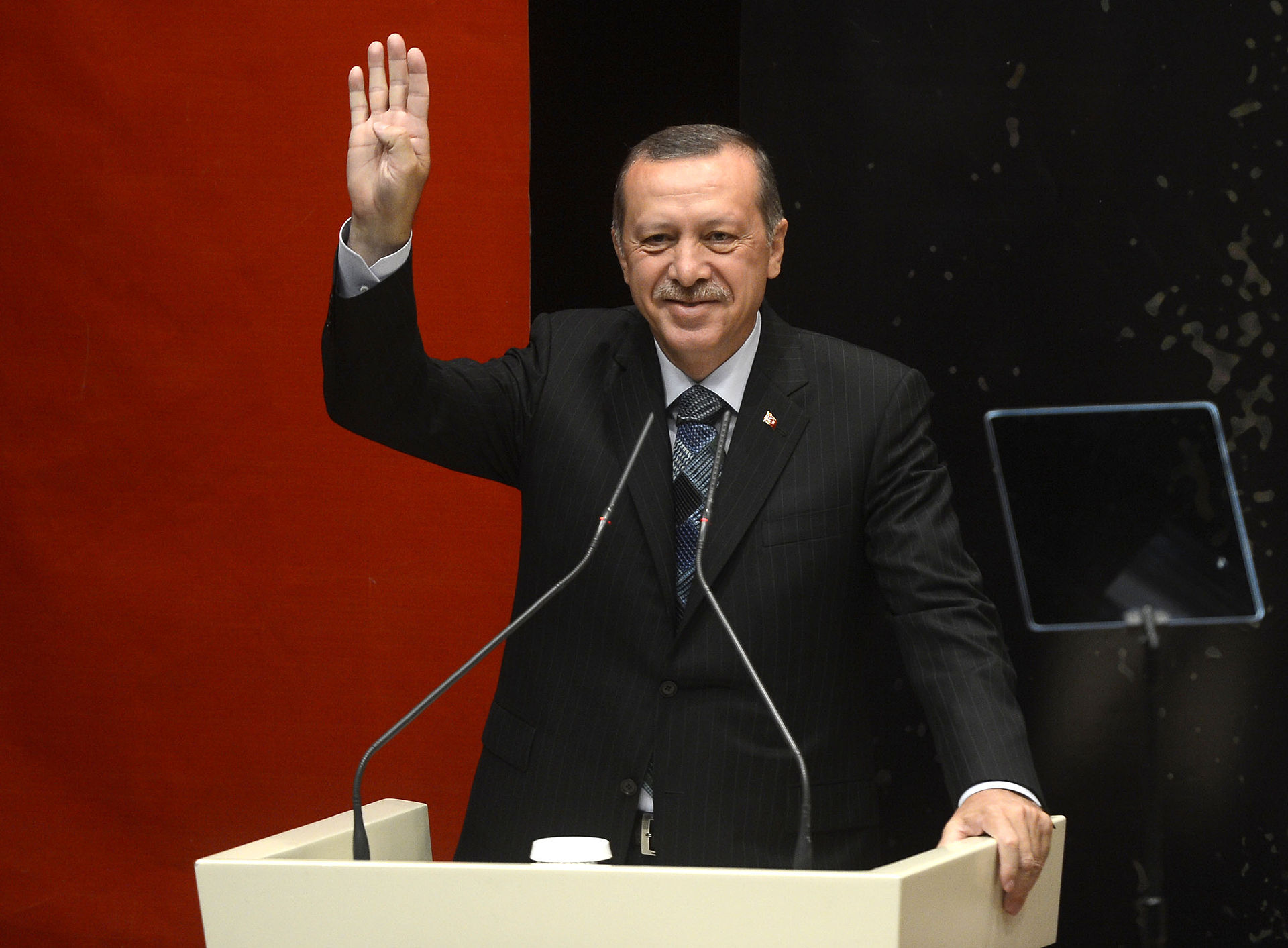 Then Turkish Prime Minister Recep Tayyip Erdoğan making the Rabia sign in 2014. PHOTO: Wikipedia/Kamu Mali