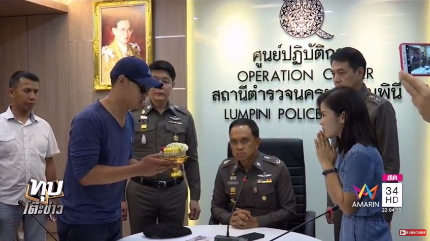 The flasher, identified as Thanyapat Srinoppanan, apologized to the victim at the press conference on Monday. Photo: Amarin TV