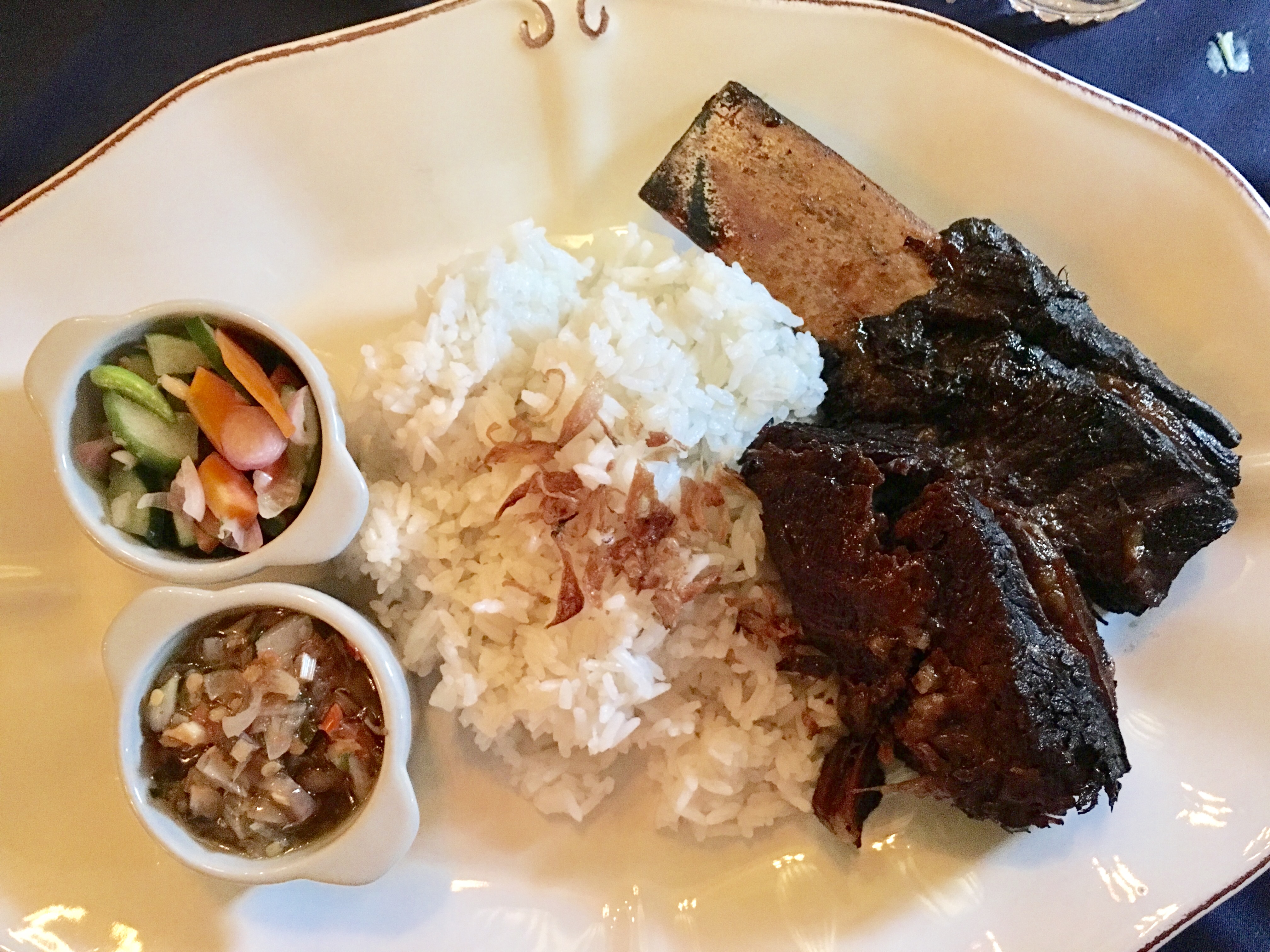 Ika bagar: eight-hour braised beef ribs with a side of rice and sambal mash.