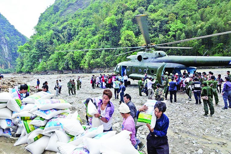 Relief aid is distributed in Kachin State in March 2017. Photo: MoI