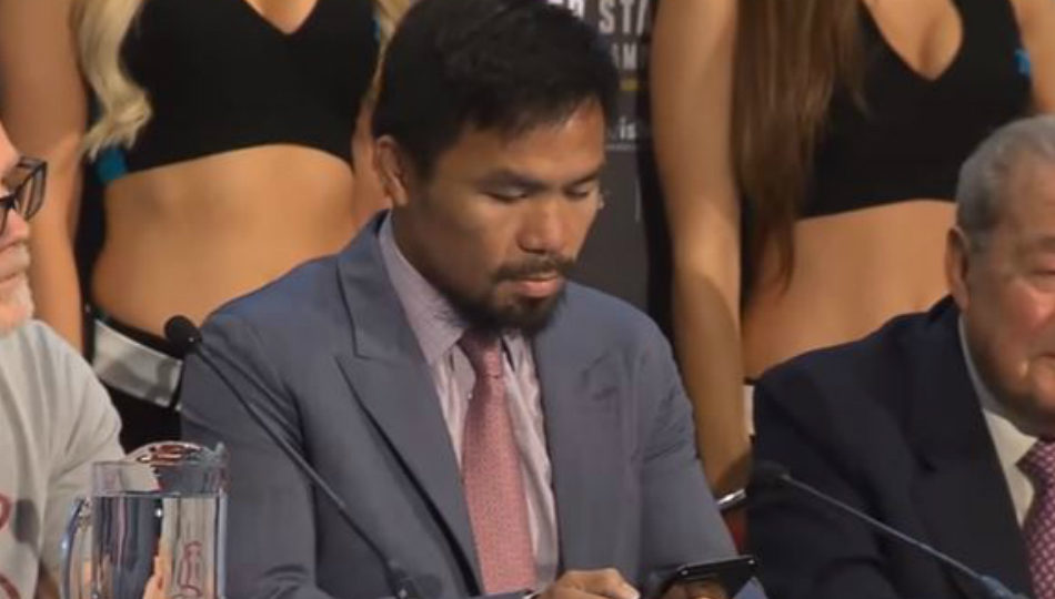 Boxer Manny Pacquiao says he was writing ‘thank you letter’ during press oncference. Photo by ABS-CBN News