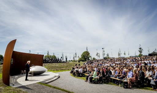 Relatives attend the unveiling ceremony of the National Monument for the MH17 victims in Vijfhuizen, on July 17, 2017 AFP PHOTO / ANP / Remko de Waal / Netherlands OUT