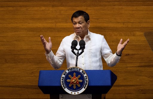 Philippine President Rodrigo Duterte gestures as he delivers his state of the nation address at Congress in Manila on July 24, 2017.
File photo: Noel Celis/AFP