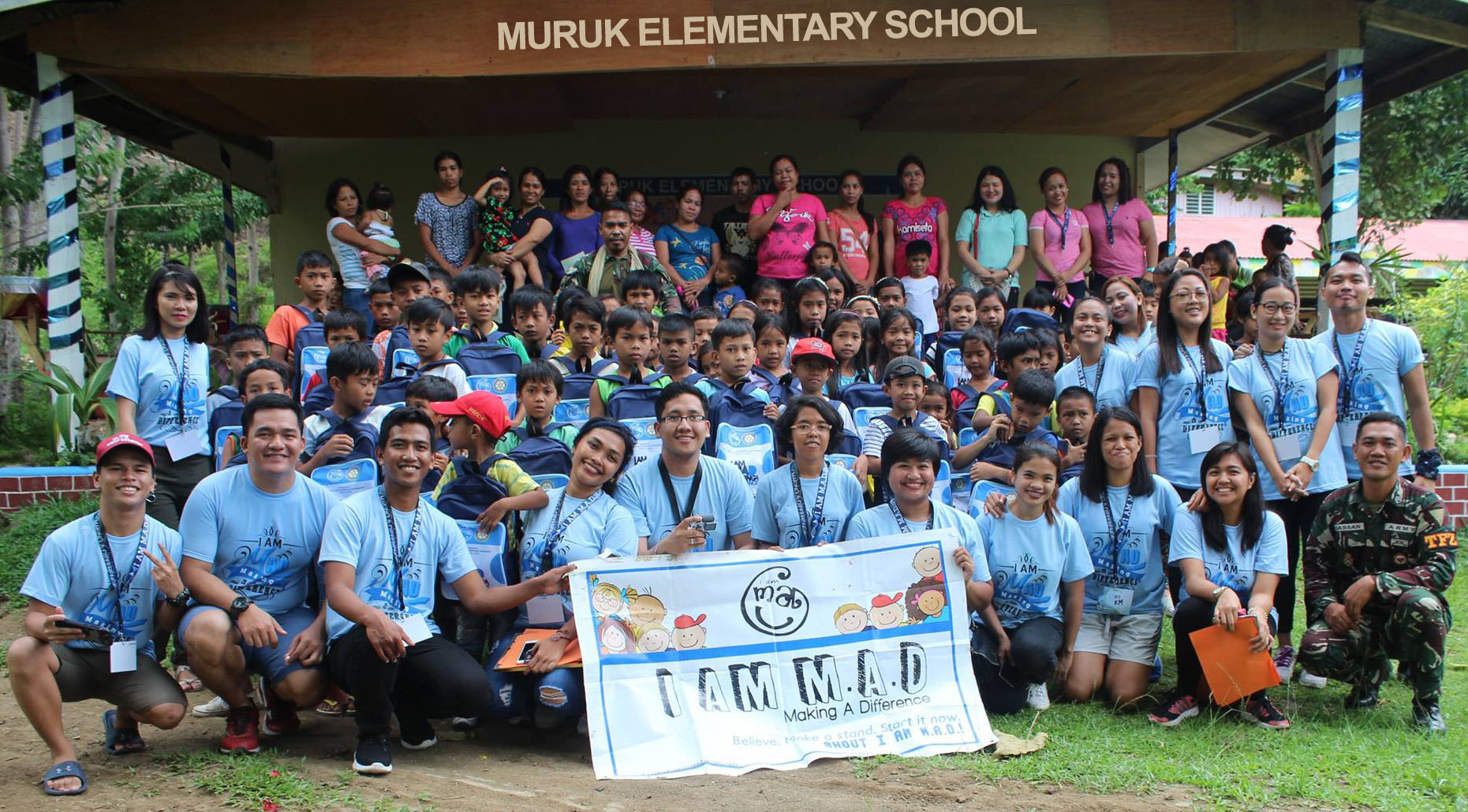 I am M.A.D. (Making A Difference) conquered Zamboanga City for its 34th MAD Camp area at Muruk Elementary School. Volunteers together with the beneficiaries, their parents, school officials and partners pose for a souvenir photo. PHOTO: I am MAD