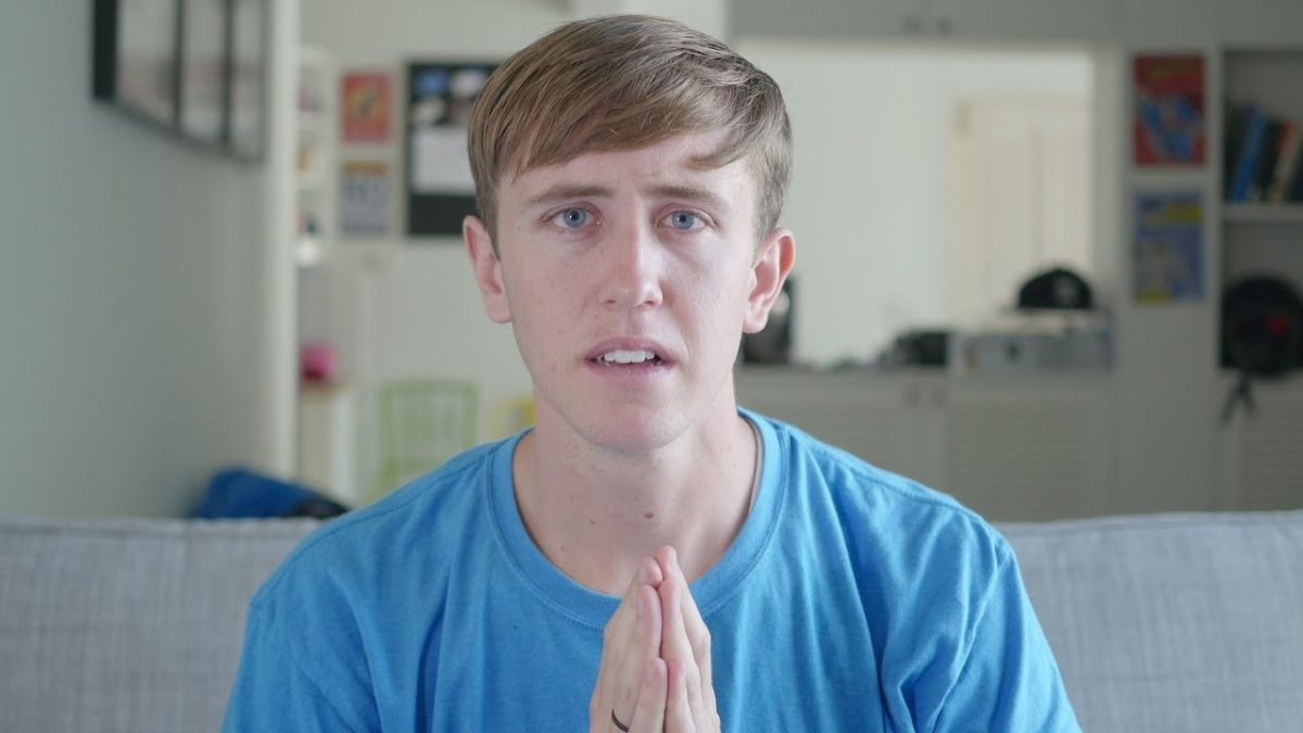 Last year My Mate Nate does an apologetic wai in a YouTube video after being criticized for mocking Thai people’s English level. Screenshot: My Mate Nate/ YouTube