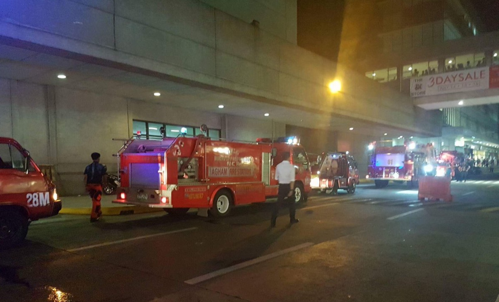Fire trucks at the scene of the fire at SM North EDSA in Quezon City. PHOTO: Twitter / Dennis Datu for DZMM