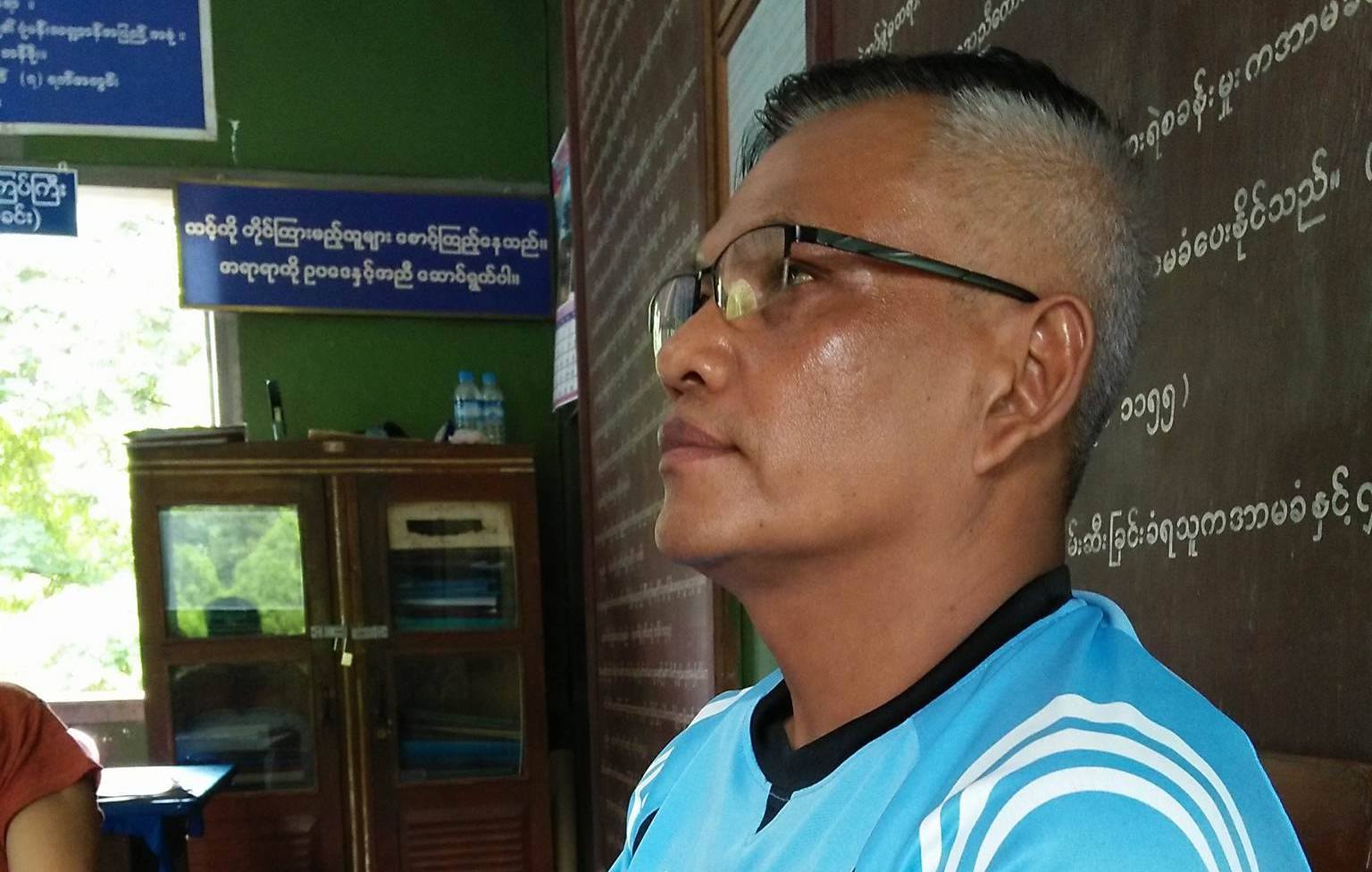 Ko Min Htay awaits a court hearing at the Banmaw police station on July 10, 2017.
