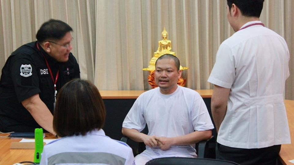 Wirapol Sukphol, formerly known as a monk named Luang Pu Nen Kham, was extradited from the U.S. to Thailand on Wednesday night. Photo: Department of Special Investigation