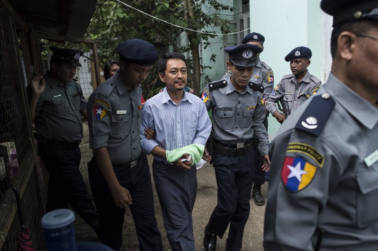 The Voice editor Kyaw Min Swe arriving to the Bahan township court for his third hearing on June 16, 2017.  
Photo: AFP / Ye Aung Thu