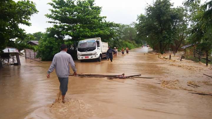 A truck in a flooded road in Magway Region. (Image for illustration purposes only.) Photo: Facebook / Magway Region Flood Information & Response Unit