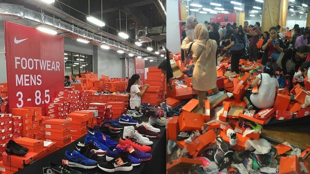 WATCH: Chaotic scenes as thousands scramble for cheap Nike shoes at