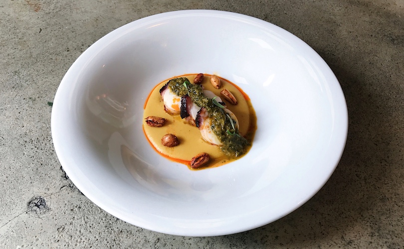 Spanish Octopus with grilled corn, chimichurri and chorizo oil. Photo: Esquina