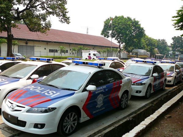 Indonesian police cars. Photo: Wikimedia Commons