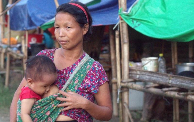 48-year-old Ar Ni fled her home in Nant Pyo village and is now taking shelter at a church in Tanai. PHOTO: Phyo Thiha Cho / Myanmar Now