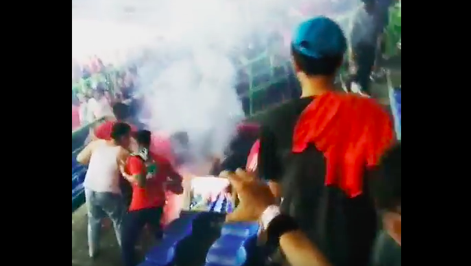 Moments after Catur was hit by a rocket flare. Photo: Video screengrab