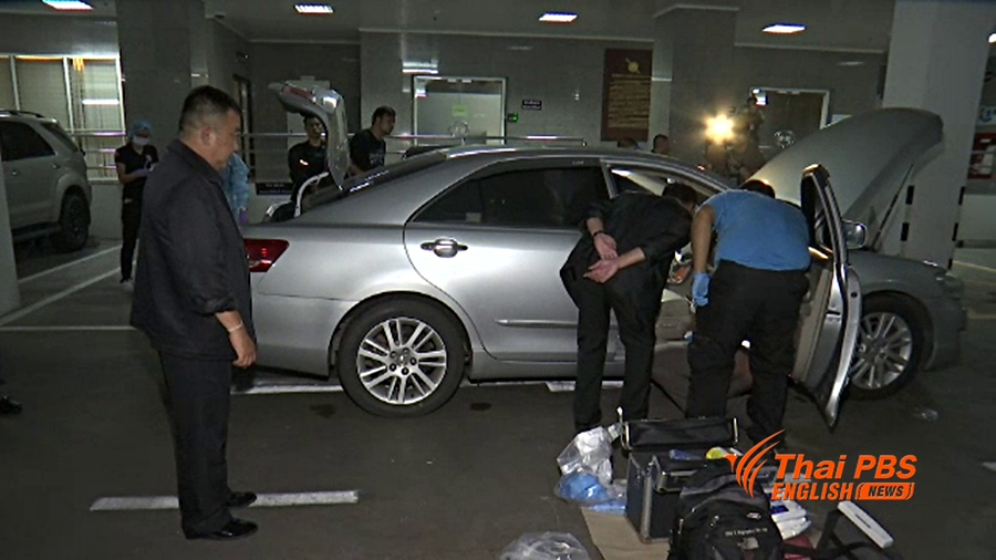 Police inspect the alleged getaway car. Photo: Thai PBS