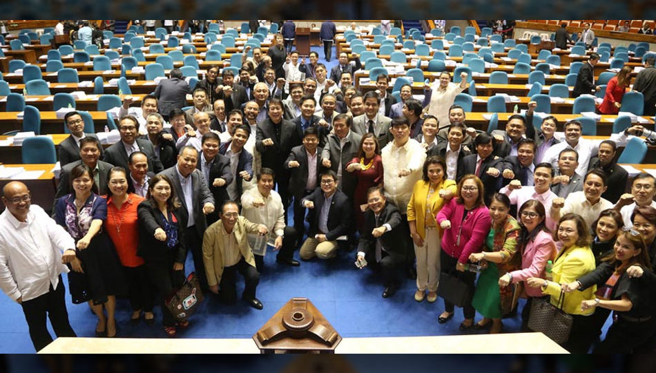 Lawmakers celebrate passing a US$20 budget for the Commission on Human Rights