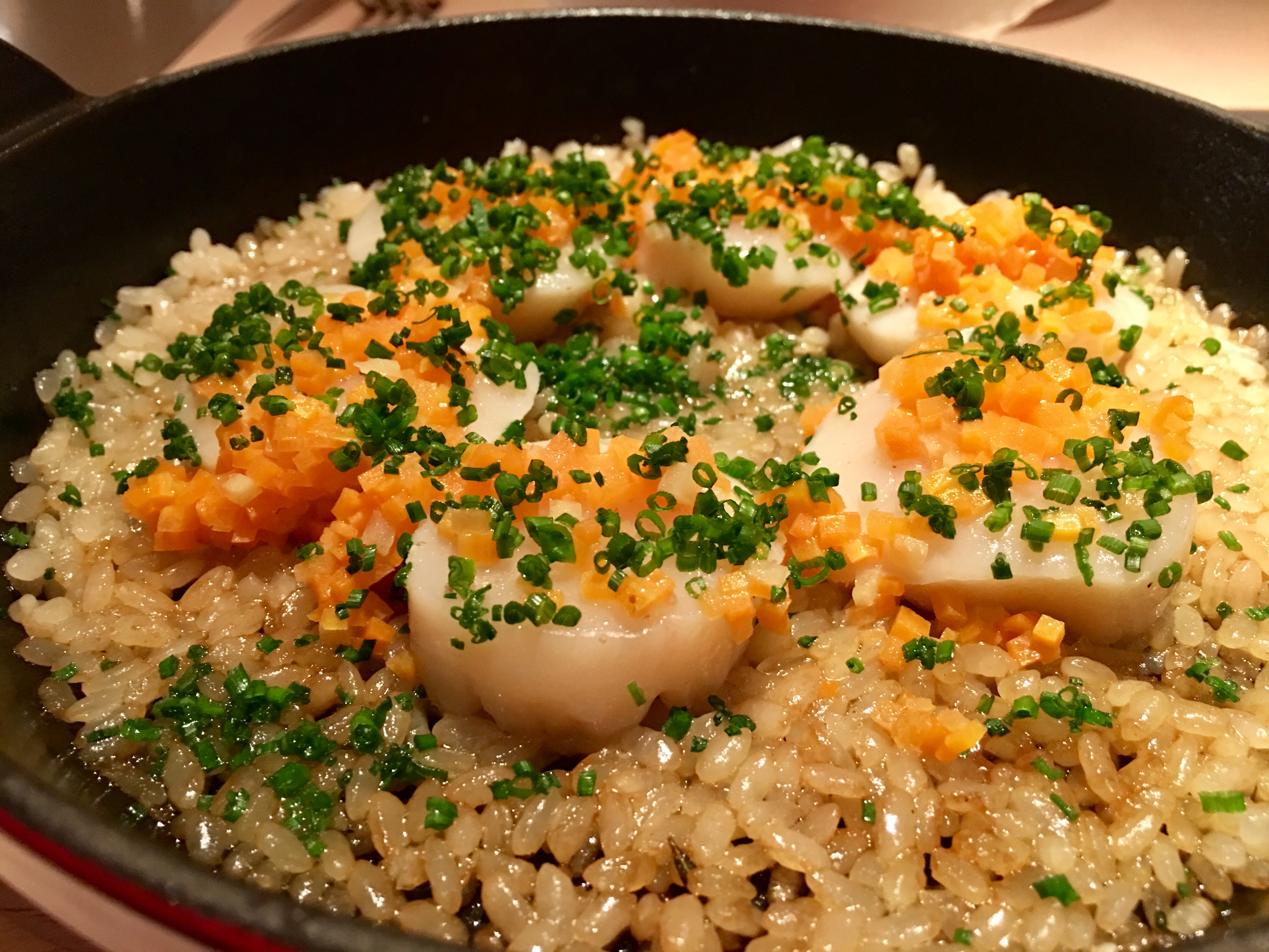 The sea scallops over pilaf rice at Terroir Parisien.