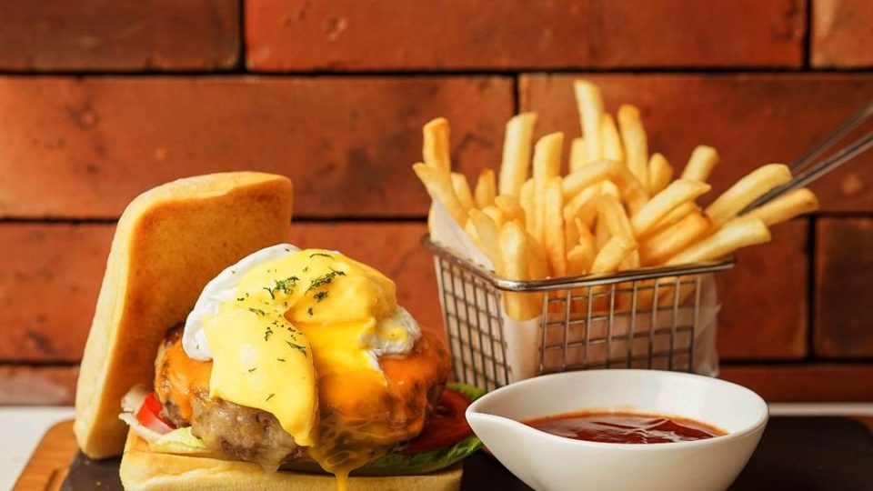 The Benedict Burger at JJ Royale Bistro, for when you can’t choose between a burger and brunch. 